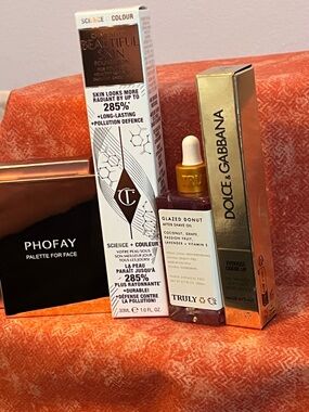 Dolce & Gabbana Gold Everkiss, Charlotte Tilbury Warm Neutral, Truly, Bronzer